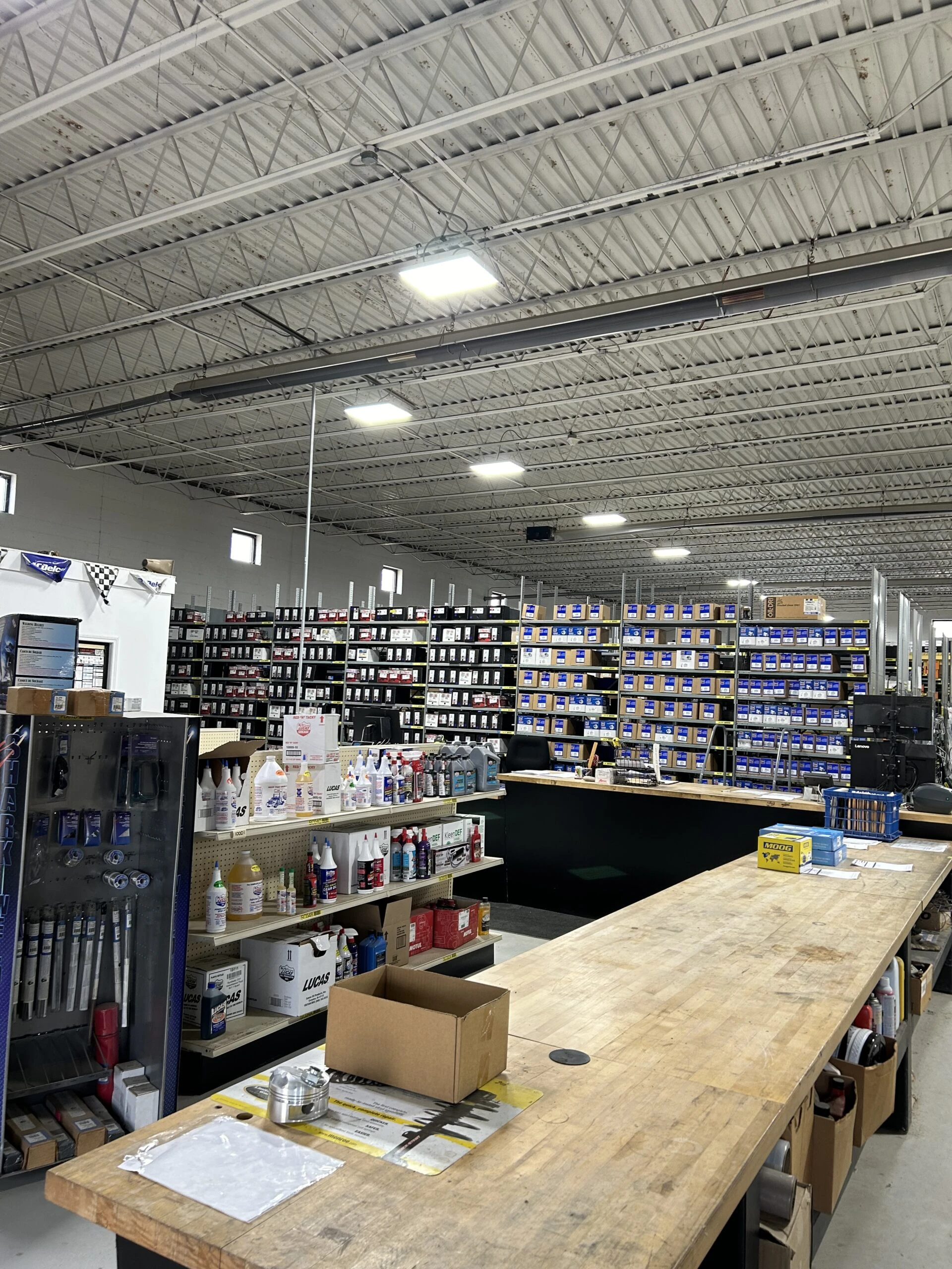An overview of the inside of the United Auto Supply store in Fulton, displaying inventory and the customer counter.