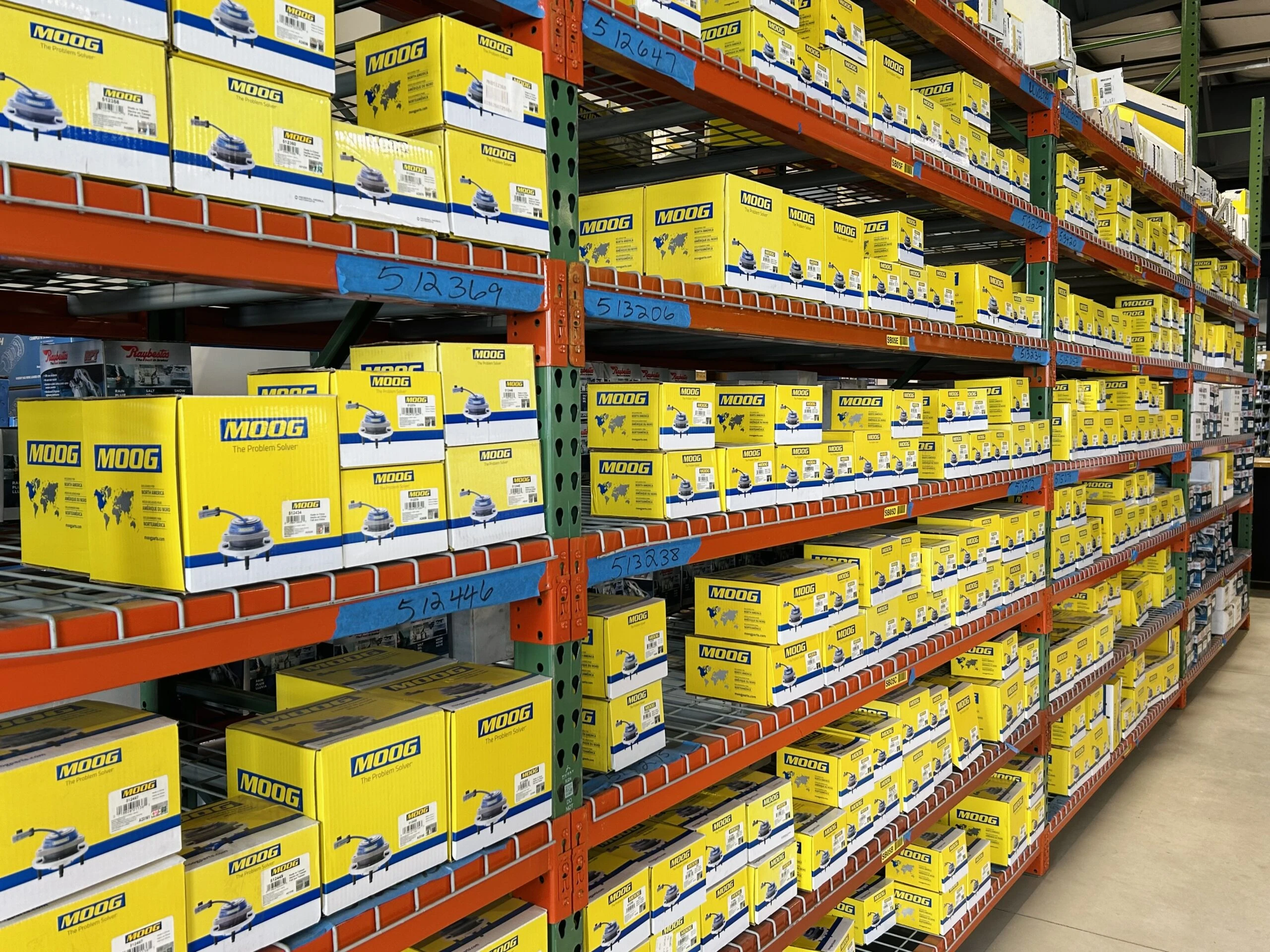 Racks of auto parts inventory that are available at the Utica store.