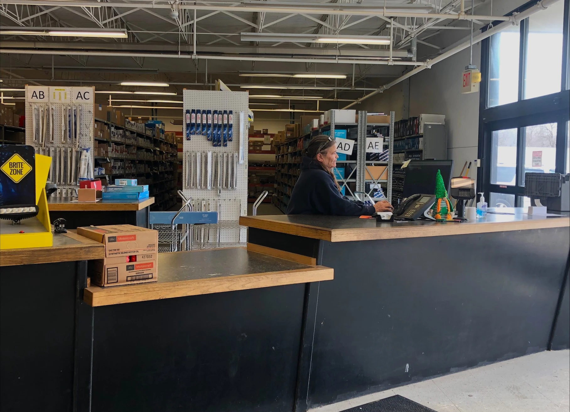 auto parts store in auburn, inside the store with a person sitting behind the counter