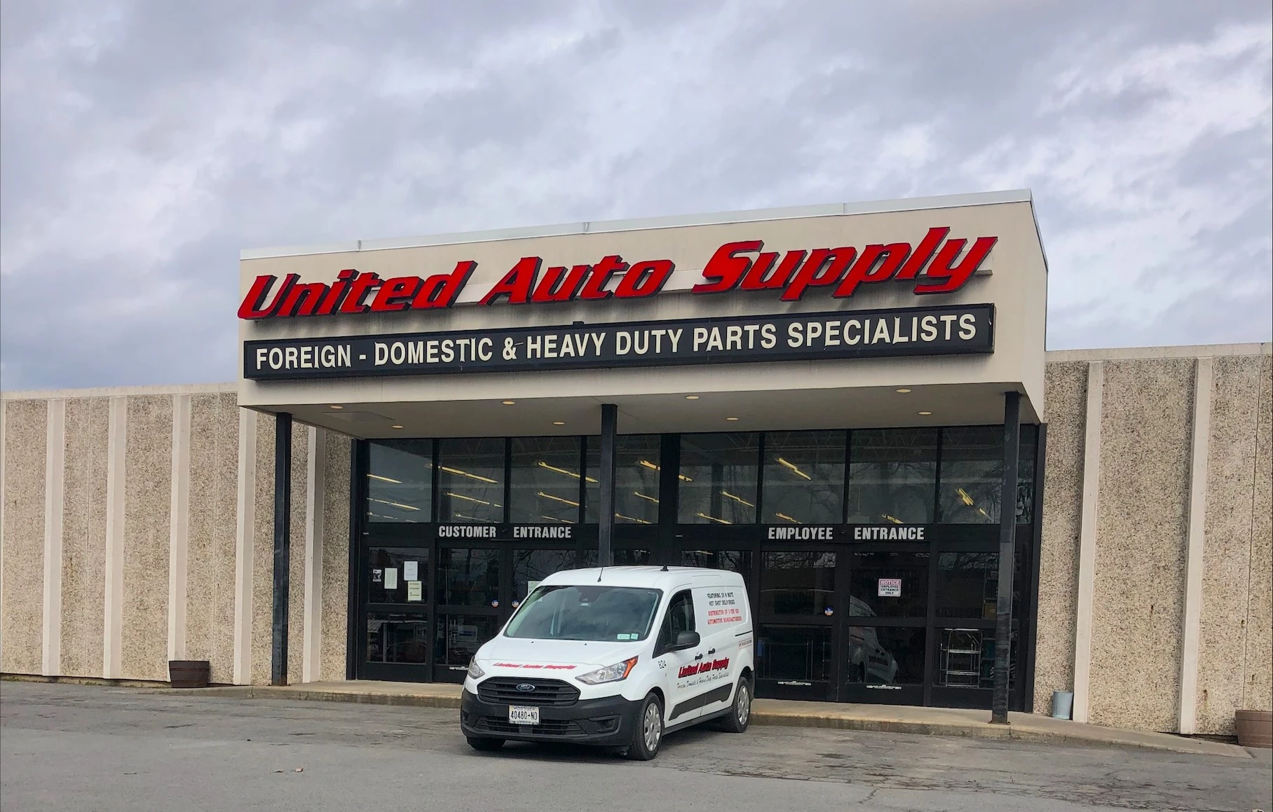 Auto Parts Auburn, United Auto Supply storefront with delivery van.