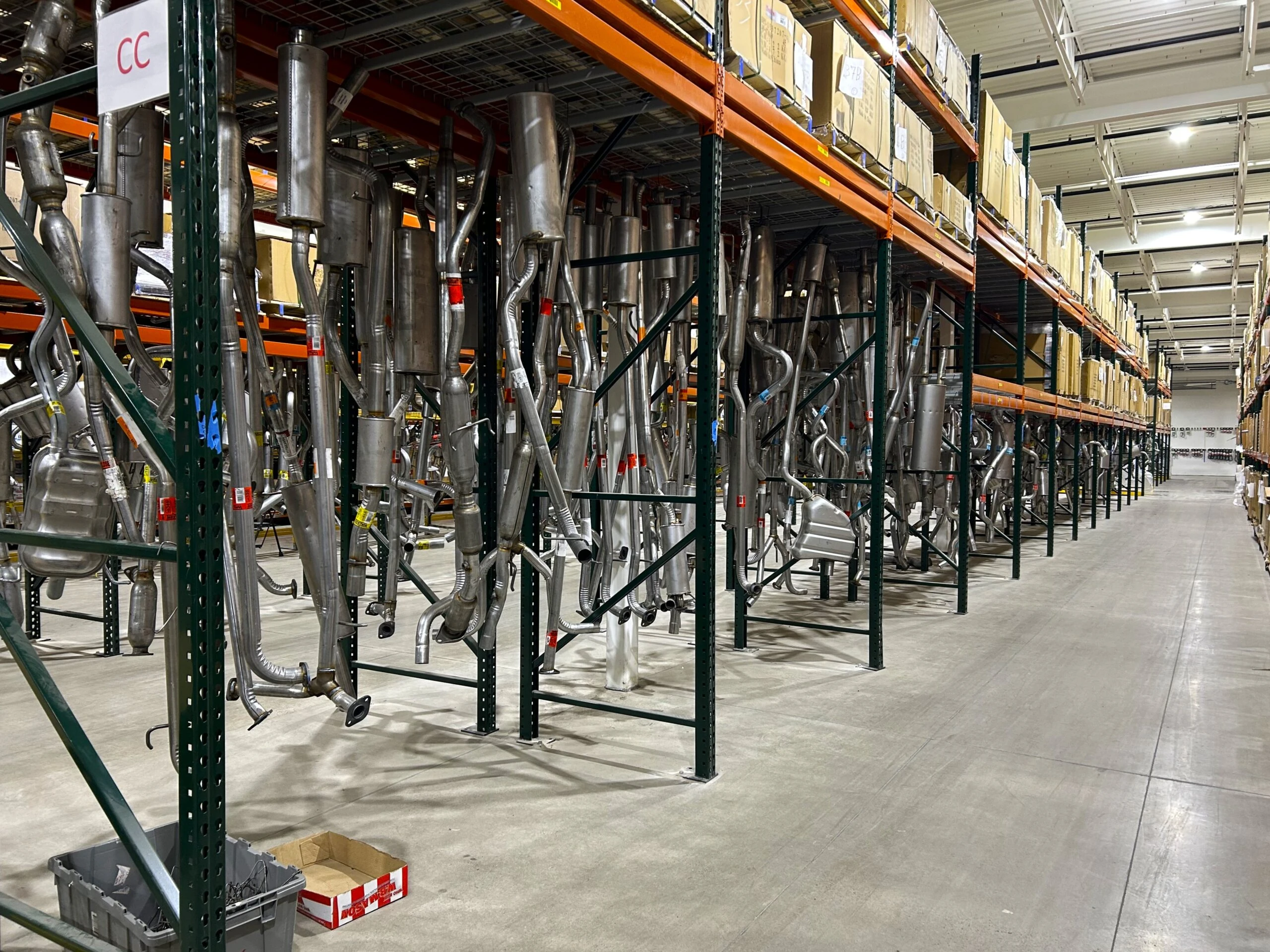 The rack of exhausts that are stocked at United Auto Supply in Rotterdam.