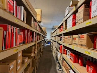 Rows of racks containing auto parts and auto related products that are stocked in the United Auto Supply store in Clifton Park.