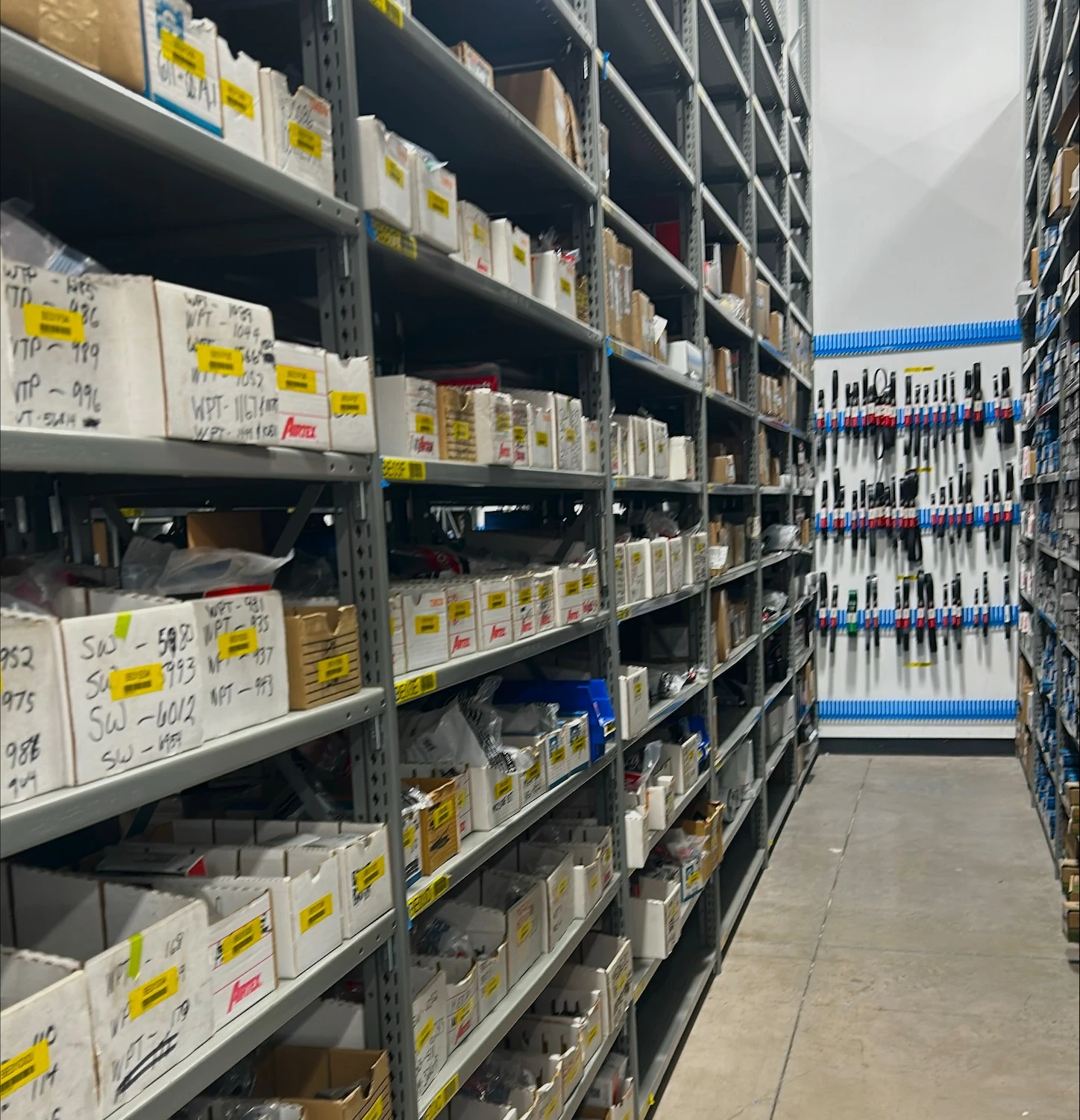 Racks of auto parts inventory stocked in UAS Syracuse.