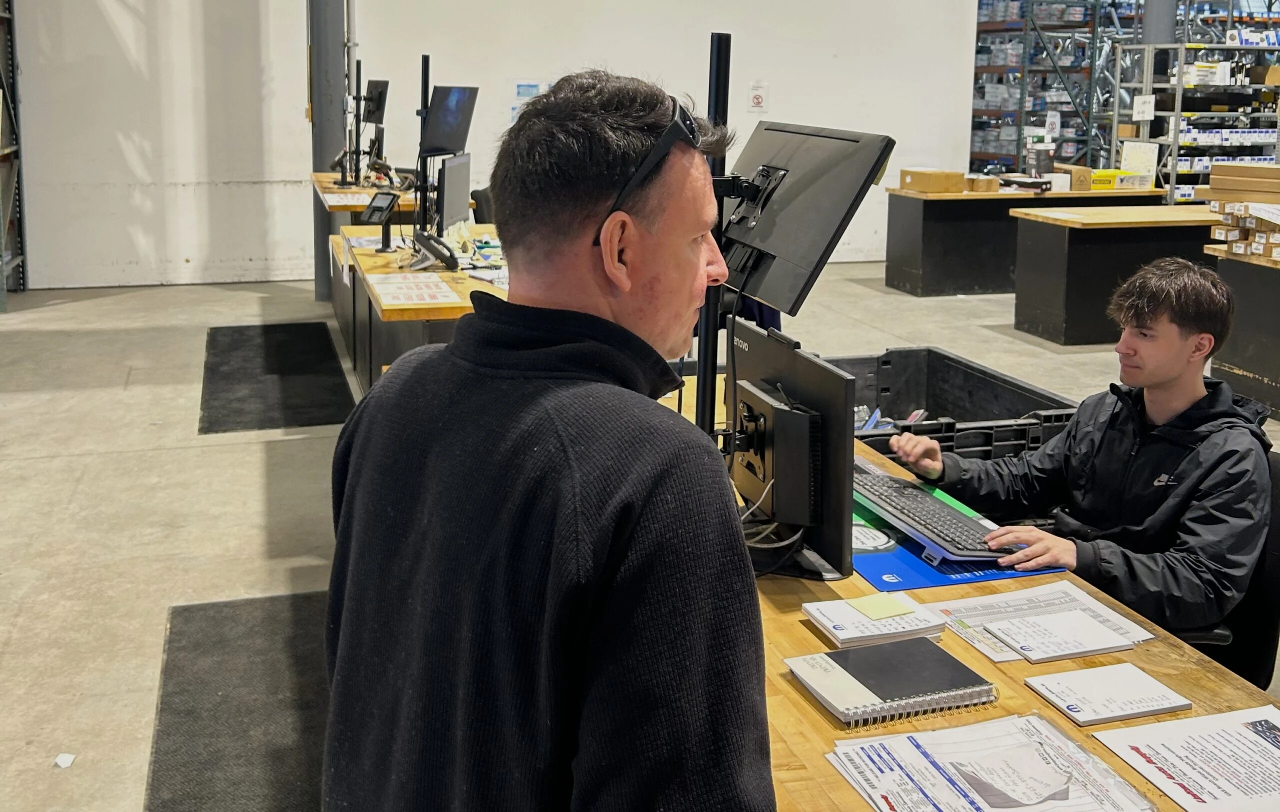 United Auto Supply employee interacting with a customer.