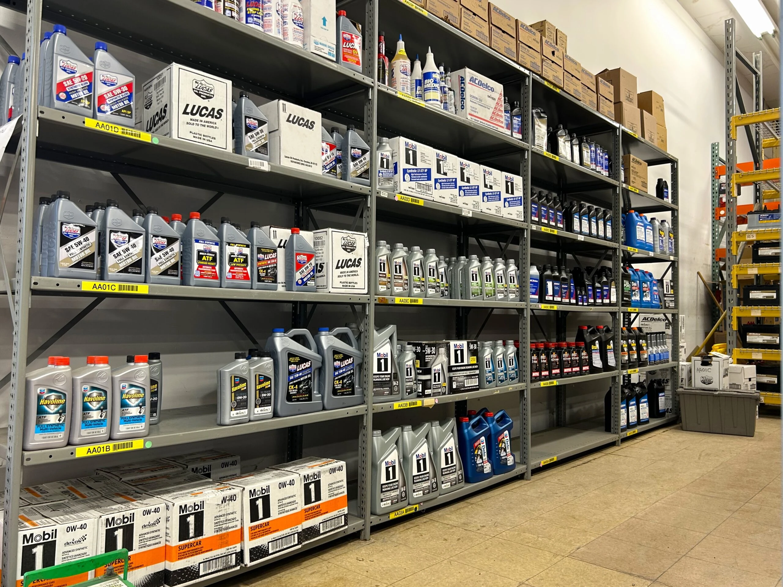 Rows of racks containing auto parts and auto related product that are stocked at United Auto Supply in Burnt Hills.