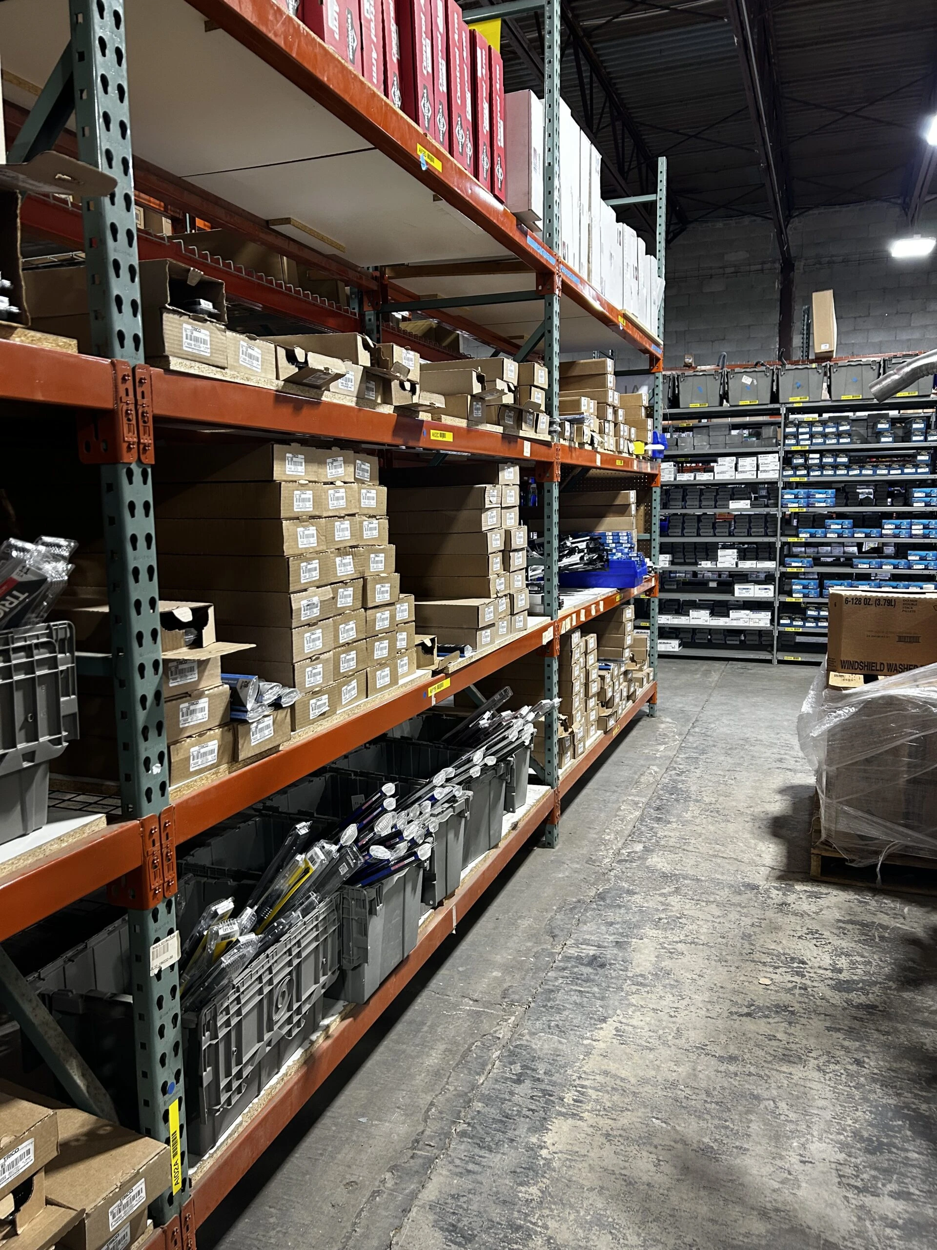 Rows of racks containing auto parts and auto related product that are stocked in United Auto Supply in Buffalo.